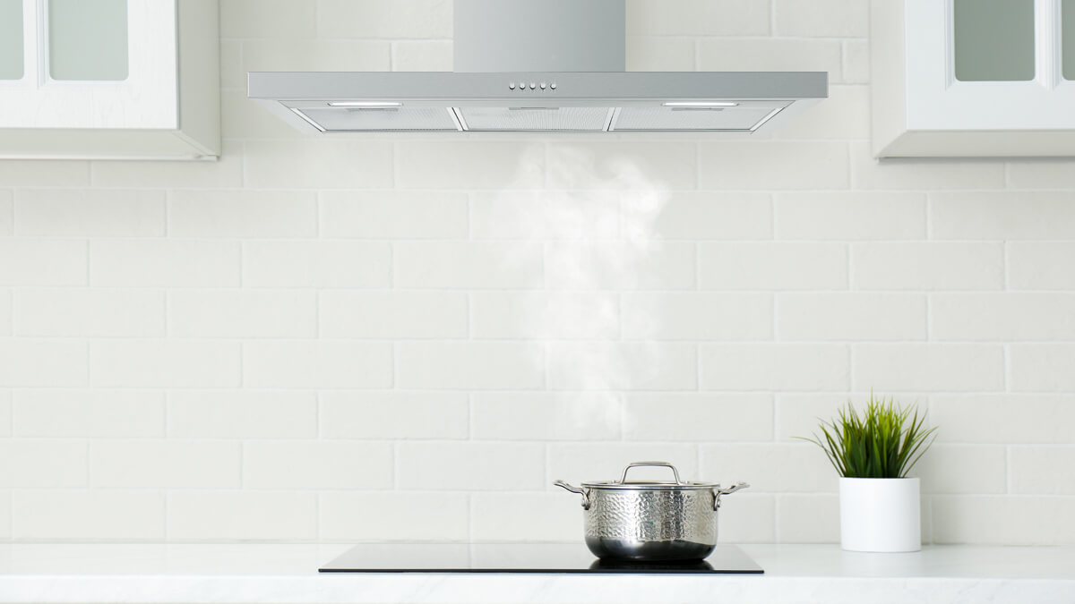 an interior kitchen render of a pot boiling on an induction cooktop